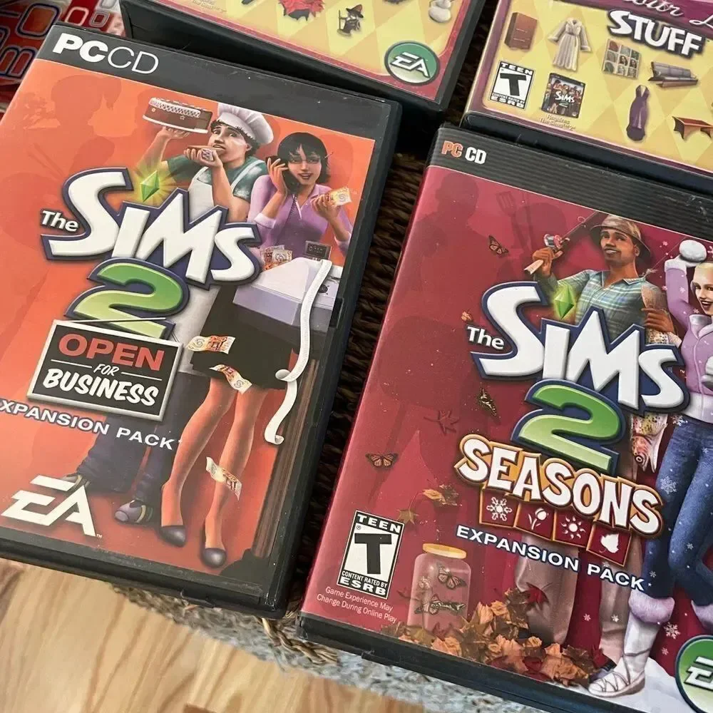 The SIMS PlayStation Vintage Side Video Game Lot PC DVD Pets Family Delux Sets